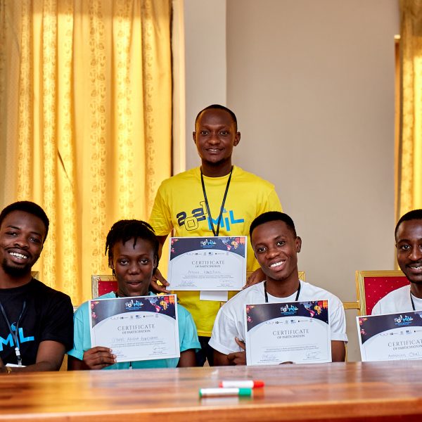 Participants displaying their certificates of participation